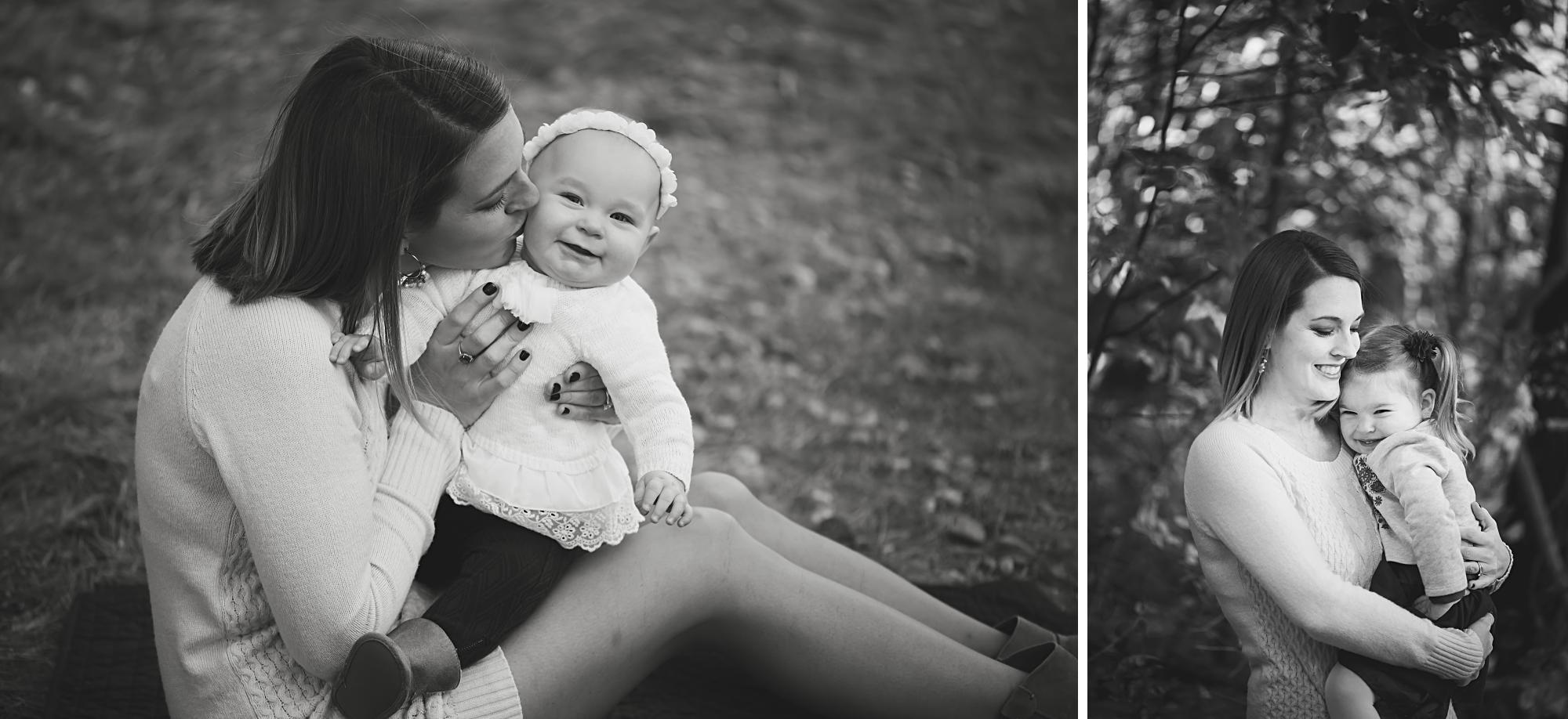 Black and white photos of mom kissing daughters outside